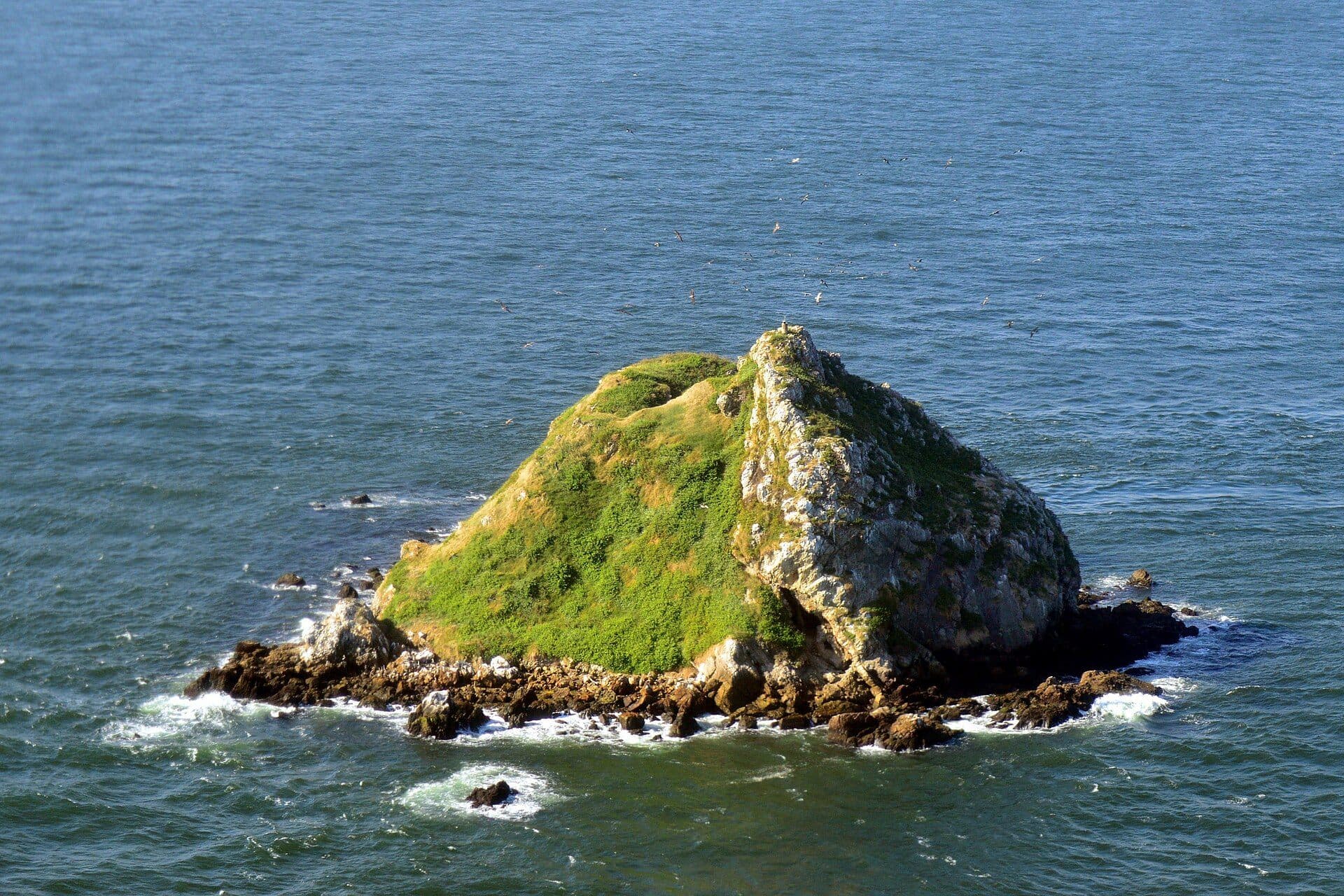 Aerial view of Soldado Rock, southwest of Trinidad in the Boca de la Serpiente